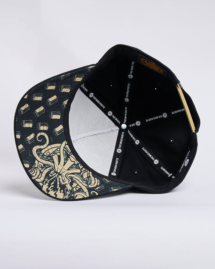 The Mad Hueys Kraken Port Hole Snapback